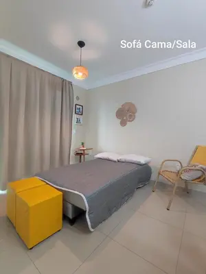 Uma cama ou camas num quarto em Apto ideal p Família, Piscina Térmica 350m Praia