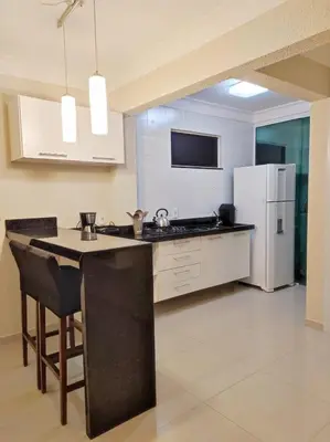 A cozinha ou kitchenette de Apto ideal p Família, Piscina Térmica 350m Praia