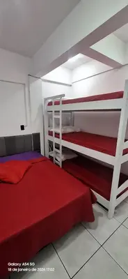 Uma cama ou camas num quarto em apartamento férias em Bombas
