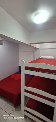 Uma cama ou camas num quarto em apartamento férias em Bombas