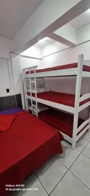 Uma cama ou camas num quarto em apartamento férias em Bombas