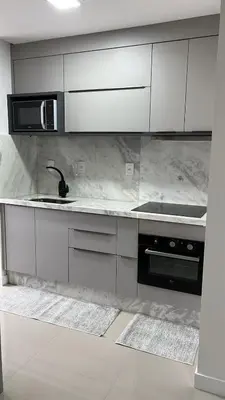 A cozinha ou kitchenette de Apartment overlooking the ocean near the Central Beach