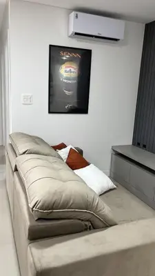 Uma cama ou camas num quarto em Apartment overlooking the ocean near the Central Beach