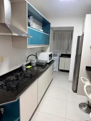 A cozinha ou kitchenette de Hermoso Apartamento Meia Praia Itapema