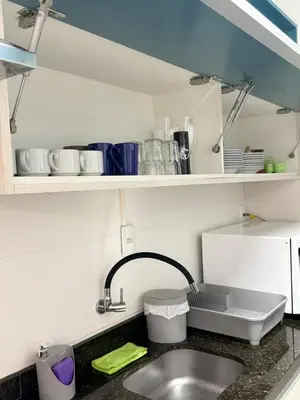 A cozinha ou kitchenette de Hermoso Apartamento Meia Praia Itapema