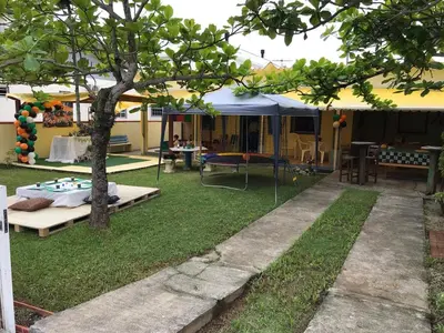 Um jardim no exterior de Casa em Palmas