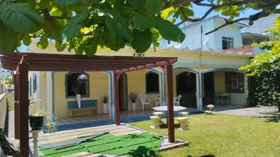 Um jardim no exterior de Casa em Palmas