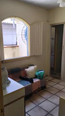 Uma cama ou camas num quarto em Casa em Palmas