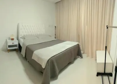 Uma cama ou camas num quarto em Apartamento com excelente localização