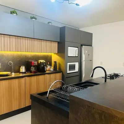 A cozinha ou kitchenette de Apartamento com excelente localização