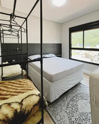 Uma cama ou camas num quarto em Apartamento AudiKar - Praia de Palmas