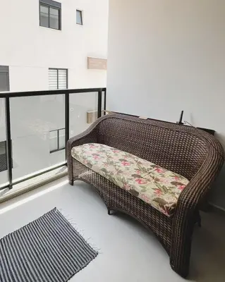 Uma área de estar em Apartamento AudiKar - Praia de Palmas