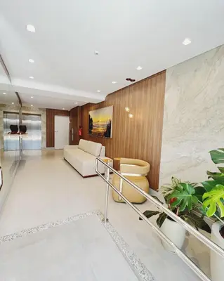 Uma área de estar em Apartamento AudiKar - Praia de Palmas