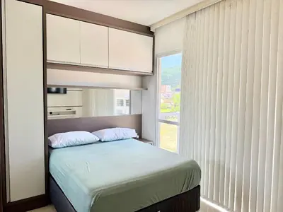 Uma cama ou camas num quarto em Apto na Praia de Palmas! ES01J