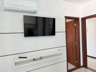 Uma televisão e/ou sistema de entretenimento em Apto na Praia de Palmas! ES01J