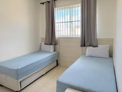 Uma cama ou camas num quarto em Apto na Praia de Palmas! ES01J