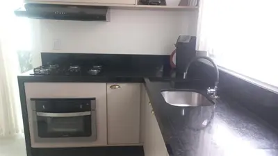 A cozinha ou kitchenette de APARTAMENTO Pé NA AREIA ITAPEMA