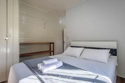 Uma cama ou camas num quarto em Casa c/ Churrasq. a 700m da Praia JSE0382