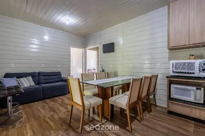 A cozinha ou kitchenette de Casa c/ Churrasq. a 700m da Praia JSE0382