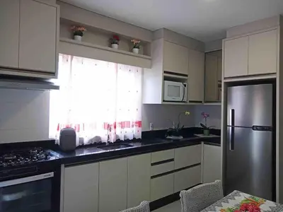 A cozinha ou kitchenette de Casa com piscina em Bombinhas - SC
