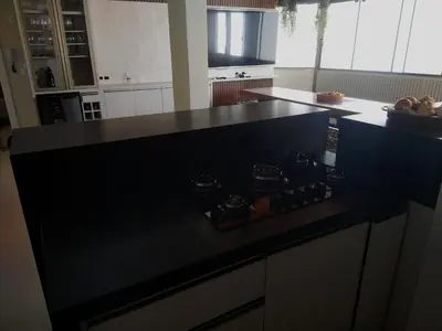 A cozinha ou kitchenette de apartamento Aconchegante 100 metros do mar