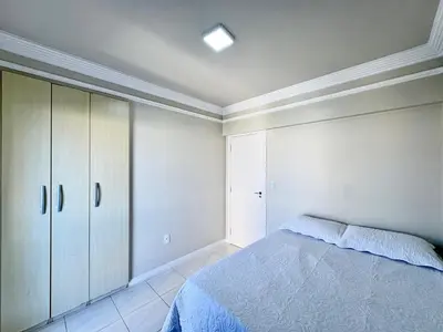 Uma cama ou camas num quarto em Apartamento vista mar - Praia de Bombas