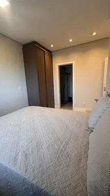 Uma cama ou camas num quarto em Apartamento vista mar na Praia de Palmas