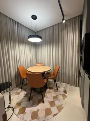 Uma televisão e/ou sistema de entretenimento em Apartamento com duas suítes próximo ao Hard Rock Café