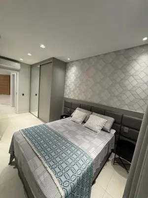 Uma cama ou camas num quarto em Apartamento com duas suítes próximo ao Hard Rock Café