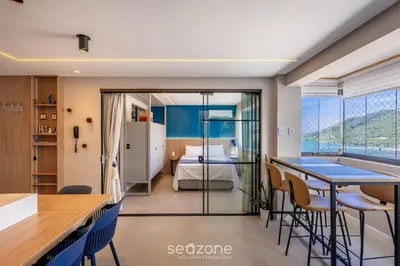 Uma cama ou camas num quarto em Apto c/ 2 suítes a beira-mar de BC - EQC0801