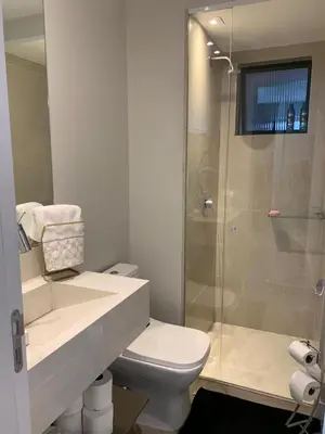 Uma casa de banho em Cond Frente Mar Barra Sul Balneario Camboriu