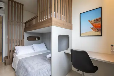 Uma cama ou camas num quarto em Vista para o Mar em Todos os Cômodos - 250m da Praia - Churrasqueira