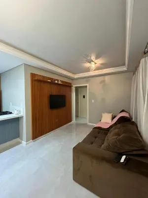 Uma televisão e/ou sistema de entretenimento em Casa 3 dormitórios Praia de Bombas