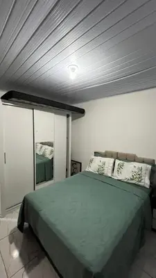 Uma cama ou camas num quarto em Casa da vó