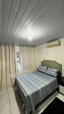 Uma cama ou camas num quarto em Casa da vó