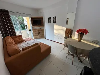 Uma área de estar em Apartamento SanKat - Praia de Palmas