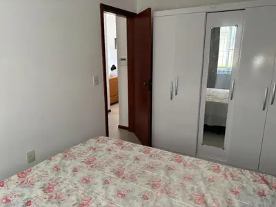 Uma cama ou camas num quarto em Apartamento SanKat - Praia de Palmas