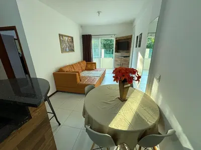 Uma área de estar em Apartamento SanKat - Praia de Palmas