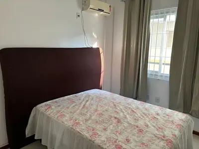 Uma cama ou camas num quarto em Apartamento SanKat - Praia de Palmas
