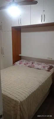 Uma cama ou camas num quarto em Ademilson