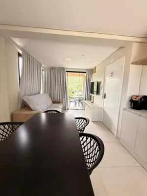 Uma televisão e/ou sistema de entretenimento em Cobertura 3 suítes a 380m Mariscal