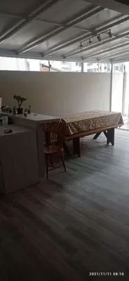 Uma área de estar em Bradesco