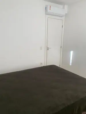 Uma cama ou camas num quarto em Apto Morretes