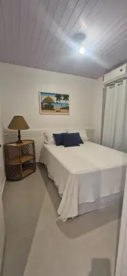 Uma cama ou camas num quarto em Conforto e Tranquilidade