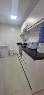 A cozinha ou kitchenette de Conforto e Tranquilidade