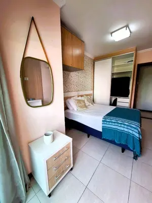 Uma cama ou camas num quarto em Apartamento do Sol - Cobertura duplex com piscina privativa, 3 dorms, 220m da praia no centro de Bombinhas