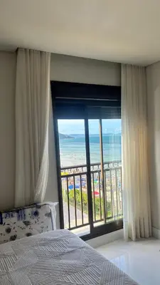 Uma cama ou camas num quarto em Cobertura Sonho de Palmas