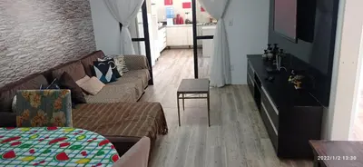 Uma área de estar em Itapema