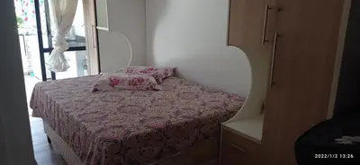 Uma cama ou camas num quarto em Itapema