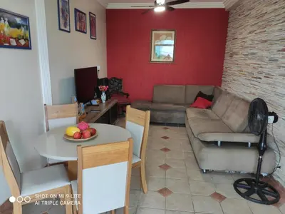 Uma área de estar em EnCanto dos Ganchos